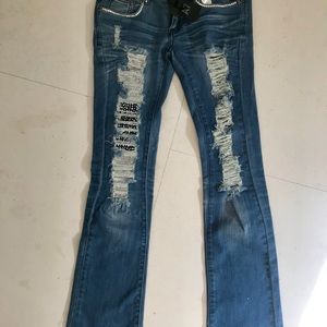 Blue jeans with crystal and metal  details